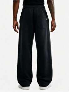 Men's Loose Fit Sports Pants, Wide Leg Casual Jogging Pants | High Waist Drawstring, 2 Deep Pockets, Open Hem, Loose Joggers, Streetwear Style - Black - View 5