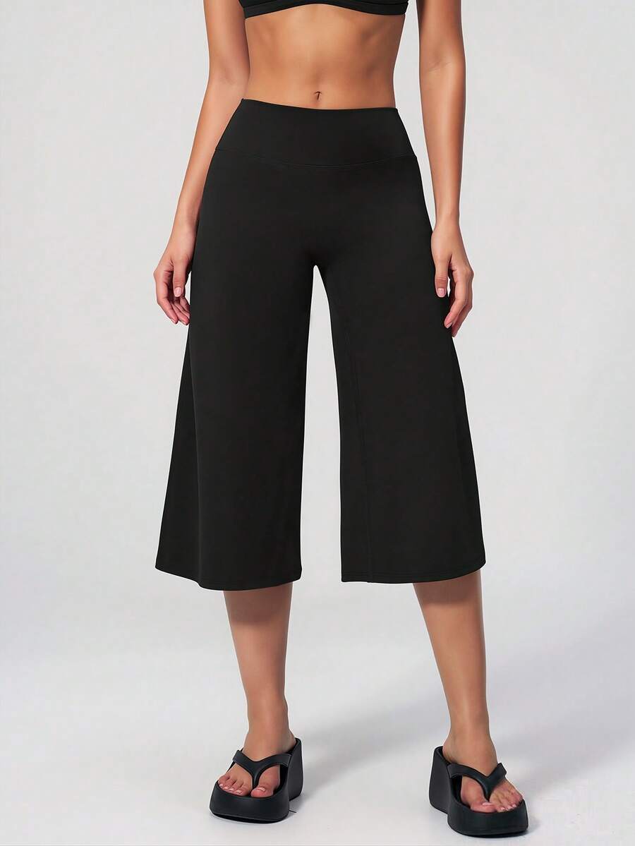 DINBEY Women's High Waist Tummy Control Butt Lifting Wide Leg Capri Yoga Pants, Soft Stretchy Non-See-Through Culottes For Workout & Lounge Sports - Black - View 1