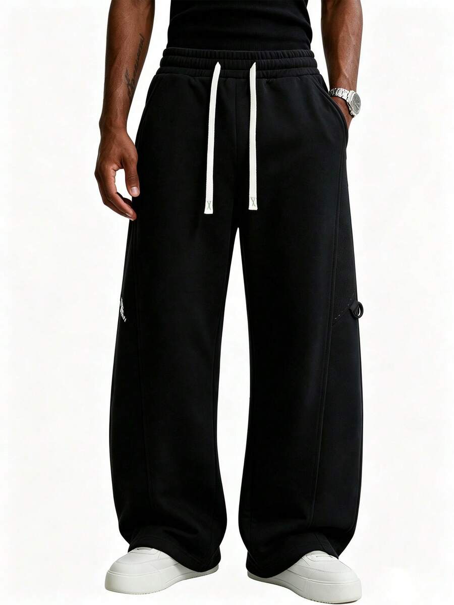 Men's Loose Fit Sports Pants, Wide Leg Casual Jogging Pants | High Waist Drawstring, 2 Deep Pockets, Open Hem, Loose Joggers, Streetwear Style - Black - View 1