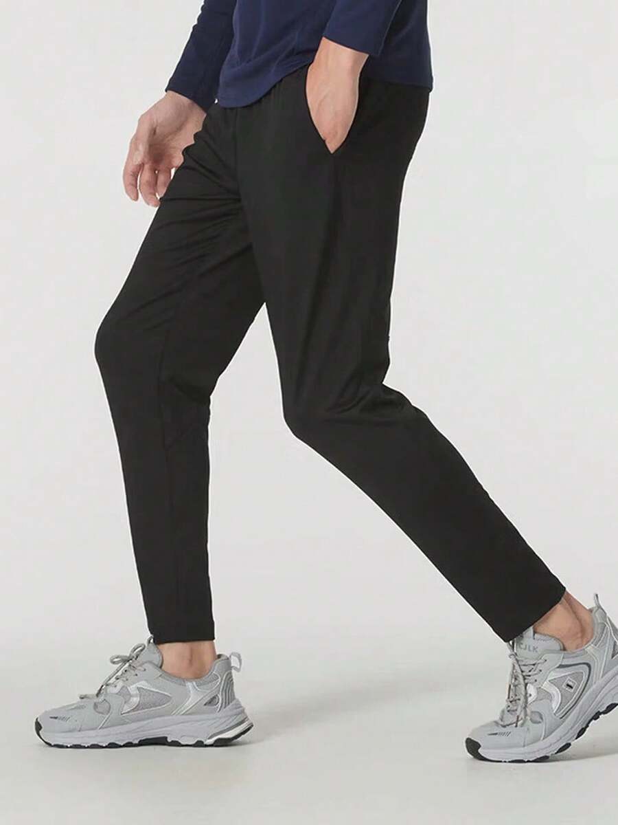 Under Armour Celana jogger pria polos, simpel, sporty, kasual, dan serbaguna. - Hitam - View 1