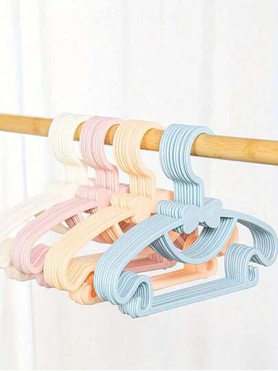 20 pièces Cintres en forme de nœud, organisateur de rangement de placard, robuste et durable, avec crochets, convient aux enfants de 0 à 10 ans, cintres et pinces de rangement essentiels pour la maison