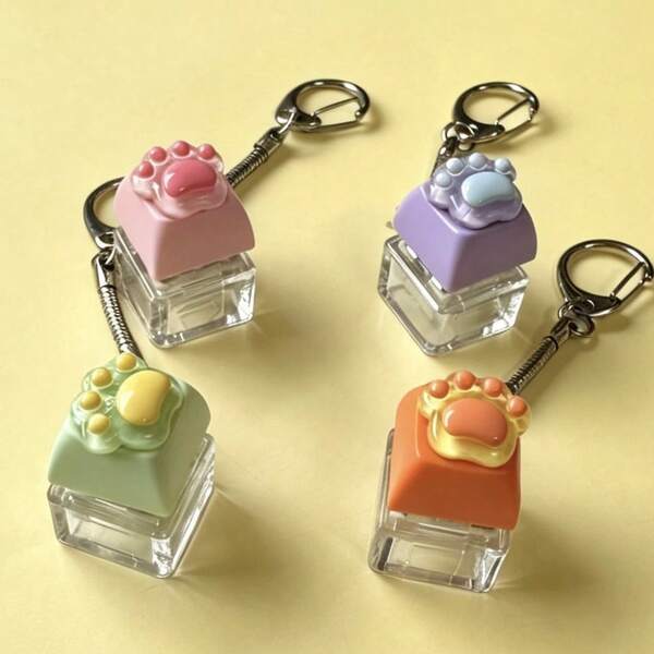 1pc Mechanical Keyboard Gadget, Novelty Keychain Ornament, Macaron Color, Cat Paw Keycap Combination Desktop Decor, Transparent Base With Cute 3D Paw Print Keycap, Metal Hook For Flexible Placement, Fresh Soft Color Palette, Minimalist Healing INS Style, Suitable For Desk And Desktop Space Decoration, Ideal As Desktop Decor And Holiday Gift