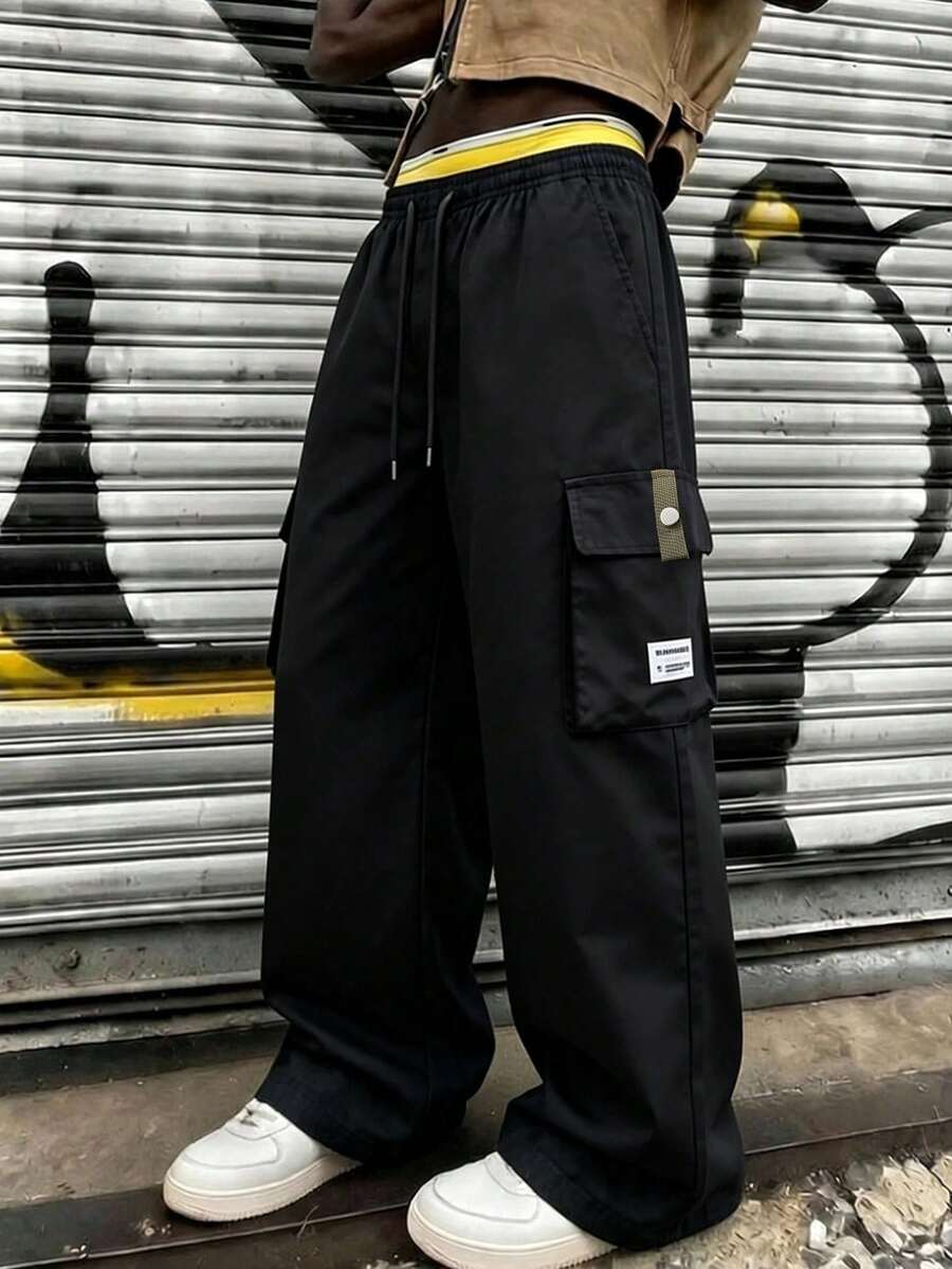 Celana Panjang Pria Hitam Model Kargo dengan Kancing Lipat, Potongan Lebar, Tali Serut, Pinggang Elastis, Saku, Potongan Longgar, Kasual, Olahraga. - Hitam - View 1