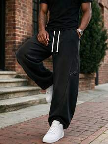 Men's Loose Fit Sports Pants, Wide Leg Casual Jogging Pants | High Waist Drawstring, 2 Deep Pockets, Open Hem, Loose Joggers, Streetwear Style - Black - View 2