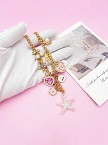 1 pieza/1 set, Encantador colgante de bolso con perla y estrella de mar, broche de lazo perlado encantador, llavero de bolso con diamante rosa premium, colgante de bolso para mujer, medalla de Charm para mochila, colgante de cadena para bolso de hombro, decoración de habitación, regalo de graduación escolar y vacaciones - Multicolor - Ver 4