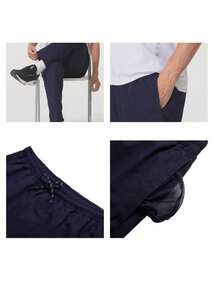 Under Armour Men's Icon Legacy Windbkr Pants, Woven Straight Leg Single Layer Travel Running Pants 1382876-410 - Blue - View 9
