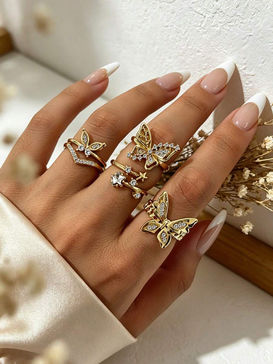 Set de 4 anillos apilables para mujer estilo Ins con mariposa y estrella de strass dorado, anillo multi-elemento con mariposa y pentagrama en forma de V totalmente de strass - Dorado - Ver 1