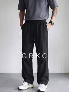 GRKC بنطلون طويل رجالي كاجوال بقصة فضفاضة وساق مستقيمة وتصميم مطوي، خصر مطاطي برباط سحب، لون سادة، متعدد الاستخدامات وبسيط للتنقل اليومي - الأسود - مشاهدة 2