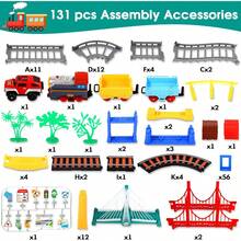 Set de Tren Eléctrico 2 en 1 para Armar, Juguete para Niños de 4 a 8 Años, Set de Vías de Tren y Coche, Puente con Luces y Sonido, Accesorios de Señales de Tráfico, Set de Juego para Niños, Regalos de Cumpleaños para Niños de 3, 4, 5, 6, 7, 8 Años - 1 - Ver 9