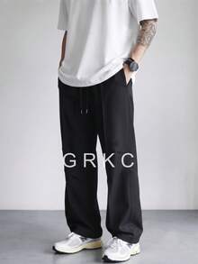 GRKC بنطلون طويل رجالي كاجوال بقصة فضفاضة وساق مستقيمة وتصميم مطوي، خصر مطاطي برباط سحب، لون سادة، متعدد الاستخدامات وبسيط للتنقل اليومي - الأسود - مشاهدة 5