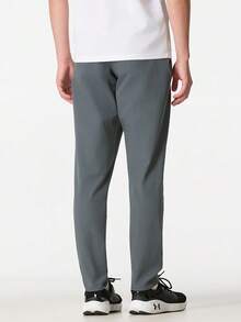 Under Armour Men's UA UNSTOPPABLE TAPERED PANTS Sports Training Casual Long Pants 1352028-012 - Black/Gray - View 3