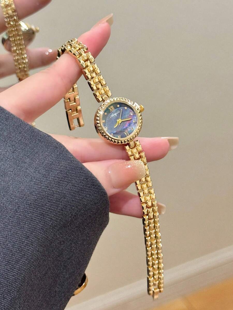 1件金色圓形女款石英手錶,精緻時尚極簡風,適合日常配戴,生日/畢業禮物,休閒聚會 - 金色 - 查看 1