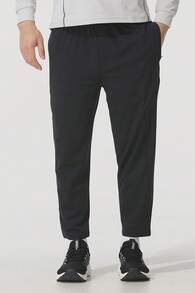 Under Armour Men's Sports Crop Cargo Pants, Knit Straight Leg Trousers For Daily Running, 1386979-001 - Black - View 1