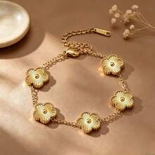 Bộ vòng tay thép không gỉ phong cách Âu Mỹ sang trọng và vòng tay cỏ bốn lá, vòng tay dạng bangle thiết kế ốc vít đính đá rhinestone mạ vàng 18K, phụ kiện cao cấp cho nữ, quà tặng tiệc - Vàng - Xem 5
