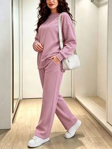 女士休闲纯色简约圆领长袖上衣，搭配女士时尚休闲纯色简约圆领长袖上衣，适合春秋季穿着。 - 粉紅色 - 查看 4