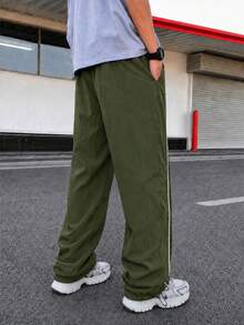 Olive Green Men's Sports Long Pants, Loose Fit Sweatpants, Contrast Trim, Drawstring Waist, Adjustable Drawstring Cuffs, Side Pockets, Athletic Wear - Army Green - View 4