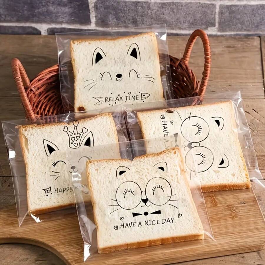 100pcs Cat Design Self-Sealing Plastic Bags, Transparent Coating Disposable Packaging, Suitable For Bread, Toast And Pastries, Transparent Sealable Gift Packaging, Suitable For Office Snack Sharing, Kitchen Essential, Suitable For Daily Item Packaging - Cat Model - View 1