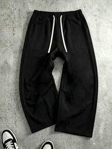 Men's Black Wide Leg Sweatpants New Casual Straight Leg Long Pants, Contrast Beige Drawstring Waist Design, Loose Drape Fit Flattering For All Body Types, Slimming And Leg-Lengthening, Side Pockets Practical For Storing Small Items. Soft Skin-Friendly Knit Fabric, Comfortable And Pill-Resistant, Suitable For Daily Commute, Streetwear, Home And Travel, Versatile All-Match Style, Pairs Well With T-Shirts, Sweatshirts And Sneakers, Simple Solid Color Durable And Timeless, Essential Casual Long Pants For Men. - Black - View 6
