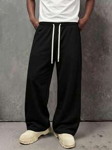 Men's Black Wide Leg Sweatpants New Casual Straight Leg Long Pants, Contrast Beige Drawstring Waist Design, Loose Drape Fit Flattering For All Body Types, Slimming And Leg-Lengthening, Side Pockets Practical For Storing Small Items. Soft Skin-Friendly Knit Fabric, Comfortable And Pill-Resistant, Suitable For Daily Commute, Streetwear, Home And Travel, Versatile All-Match Style, Pairs Well With T-Shirts, Sweatshirts And Sneakers, Simple Solid Color Durable And Timeless, Essential Casual Long Pants For Men. - Black - View 8