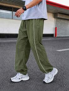 Olive Green Men's Sports Long Pants, Loose Fit Sweatpants, Contrast Trim, Drawstring Waist, Adjustable Drawstring Cuffs, Side Pockets, Athletic Wear - Army Green - View 2