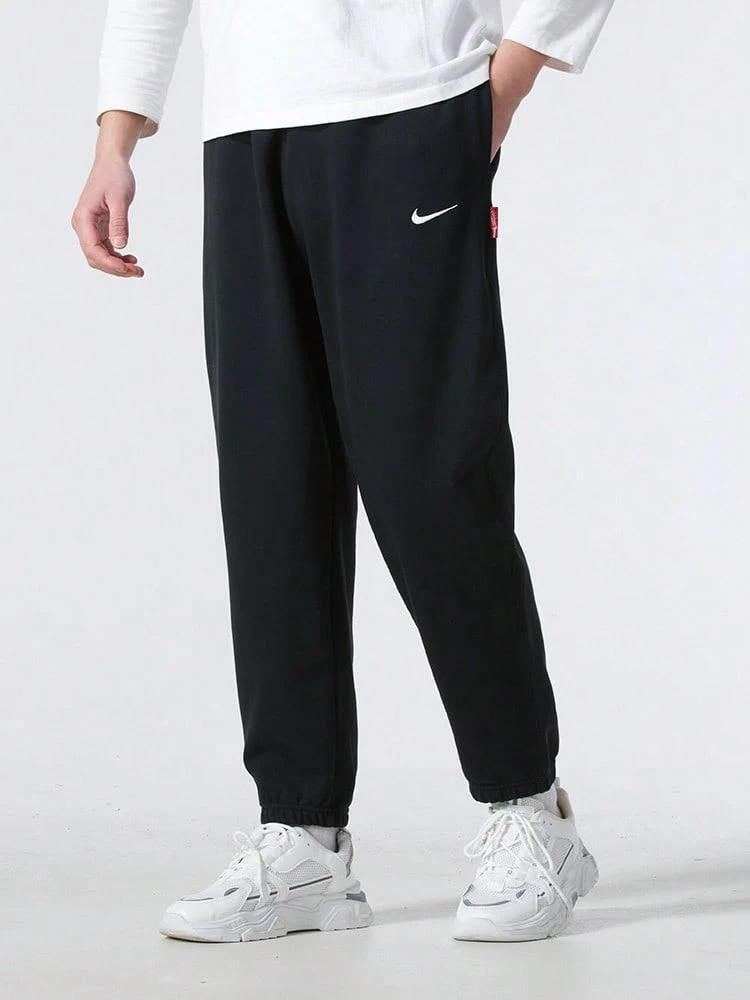 Nike Sportswear Men's Casual Pants, Soft, Breathable, Versatile, And Comfortable For Outdoor Wear - Black - View 1