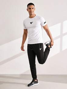 Driftmere Men's Short Sleeve T-Shirt And Long Pants Sports Set, Gym - White - View 1