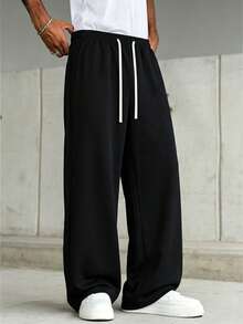 Men's Black Wide Leg Sweatpants New Casual Straight Leg Long Pants, Contrast Beige Drawstring Waist Design, Loose Drape Fit Flattering For All Body Types, Slimming And Leg-Lengthening, Side Pockets Practical For Storing Small Items. Soft Skin-Friendly Knit Fabric, Comfortable And Pill-Resistant, Suitable For Daily Commute, Streetwear, Home And Travel, Versatile All-Match Style, Pairs Well With T-Shirts, Sweatshirts And Sneakers, Simple Solid Color Durable And Timeless, Essential Casual Long Pants For Men. - Black - View 5