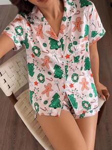 Julpyjamas för kvinnor, 2-delat set i satin med julgran- och pepparkaksman-motiv, kortärmad topp med krage och shorts med rosett - Aprikos - Visa 1