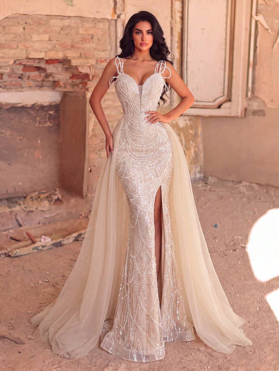 Gaun Maxi Mermaid Tanpa Lengan dengan Tali Bahu Tipis yang Elegan untuk Wanita, Dilengkapi Detail Manik-Manik dan Mutiara, Sempurna untuk Acara Formal dan Prom.