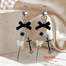 1 pieza/2 piezas Llavero unisex estilo dulce y fresco con jeringa cruzada, accesorio creativo con lazo y cuentas, colgante para bolso y llaves - Multicolor - Ver 5