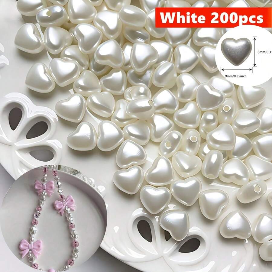 200 buah manik-manik lepas berbentuk hati berwarna putih krem ukuran 9 x 8 mm, dengan efek mutiara, cocok untuk pembuatan perhiasan, gelang, dan manik-manik pemisah.