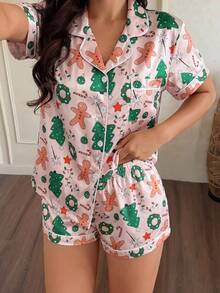 Julpyjamas för kvinnor, 2-delat set i satin med julgran- och pepparkaksman-motiv, kortärmad topp med krage och shorts med rosett - Aprikos - Visa 5