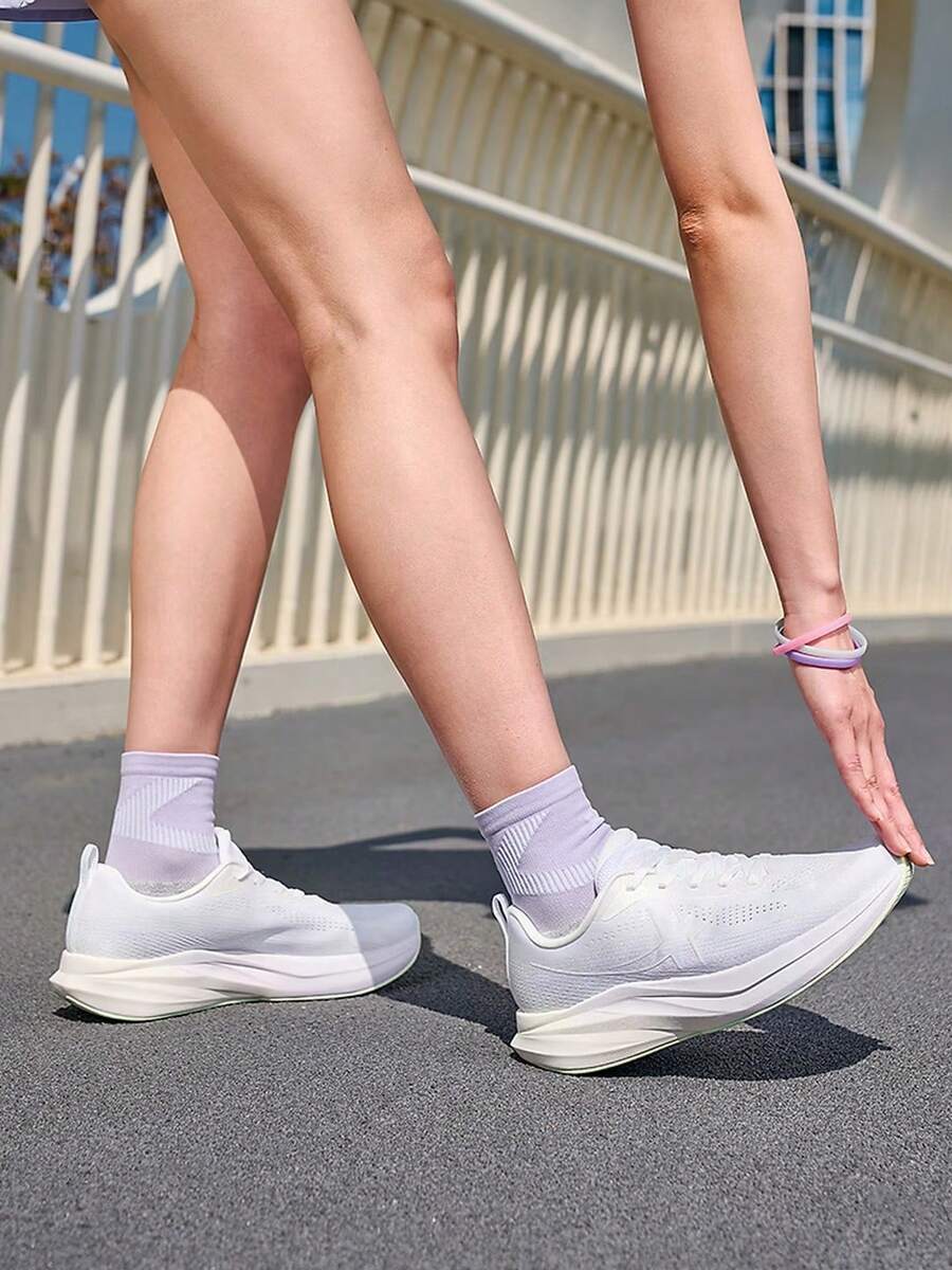 XTEP New Shock-Absorbing Rebound Mesh Breathable Versatile Lightweight Women's Running Shoes - White/Purple - View 1