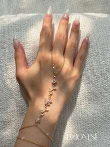 EchoNest 1pc Gold Stainless Steel Pink Flower Linked Finger Bracelet With Zirconia, Vacation Party Finger Chain Decorative Accessory - Yellow Gold - View 2