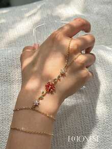 EchoNest 1pc Golden Stainless Steel Red Flower Linked Finger Bracelet With Zirconia, Vacation Party Finger Chain Decorative Accessory - Yellow Gold - View 2