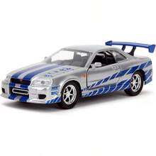 سيارة Jada Toys Fast & Furious Brian's Nis-San Skyline GT-R BNR34 من المعدن المصبوب، مقياس 1:32، سيارة رياضية أسطورية JDM، نسخة سباق فضية، سيارة فيلم معدنية مفصلة قابلة للجمع، زينة عرض لعشاق السيارات، هدية لمحبي Fast & Furious - متعدد الألوان - مشاهدة 13