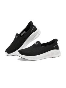 Skechers Women's Slip-Ins Lightweight Cushioned Hands-Free Breathable Mesh Walking Shoes - Black - View 1
