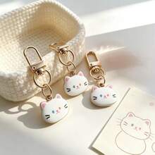 3 piezas Llavero mini con cara de gato kawaii, encantador colgante de cabeza de gato mascota, llavero de metal esmaltado con forma de gato, accesorio muy atractivo para bolso y billetera, pequeño regalo para mujeres y adolescentes, accesorio diario para amantes de los gatos, pequeño regalo de cumpleaños y vacaciones - Multicolor - Ver 7