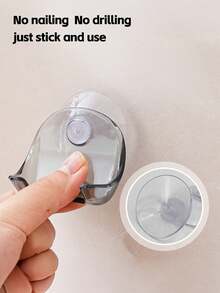 A Wall-Mounted, Multi-Functional Suction-Cup Holder Made Of Durable Plastic. It Features Strong Suction And A Non-Slip Design, Making It Suitable For Installation On Bathroom Or Kitchen Walls To Store Items Such As Razors And Towels. - Multicolor - View 5