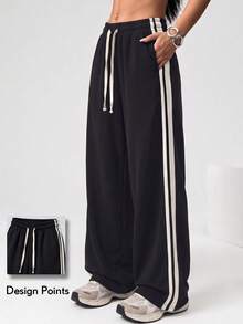 KyrLssu Women's Drawstring Elastic Waist Wide Leg Track Pants, Side Double Stripes, Loose Casual Trousers For Daily Streetwear & Light Sports. - Black - View 1