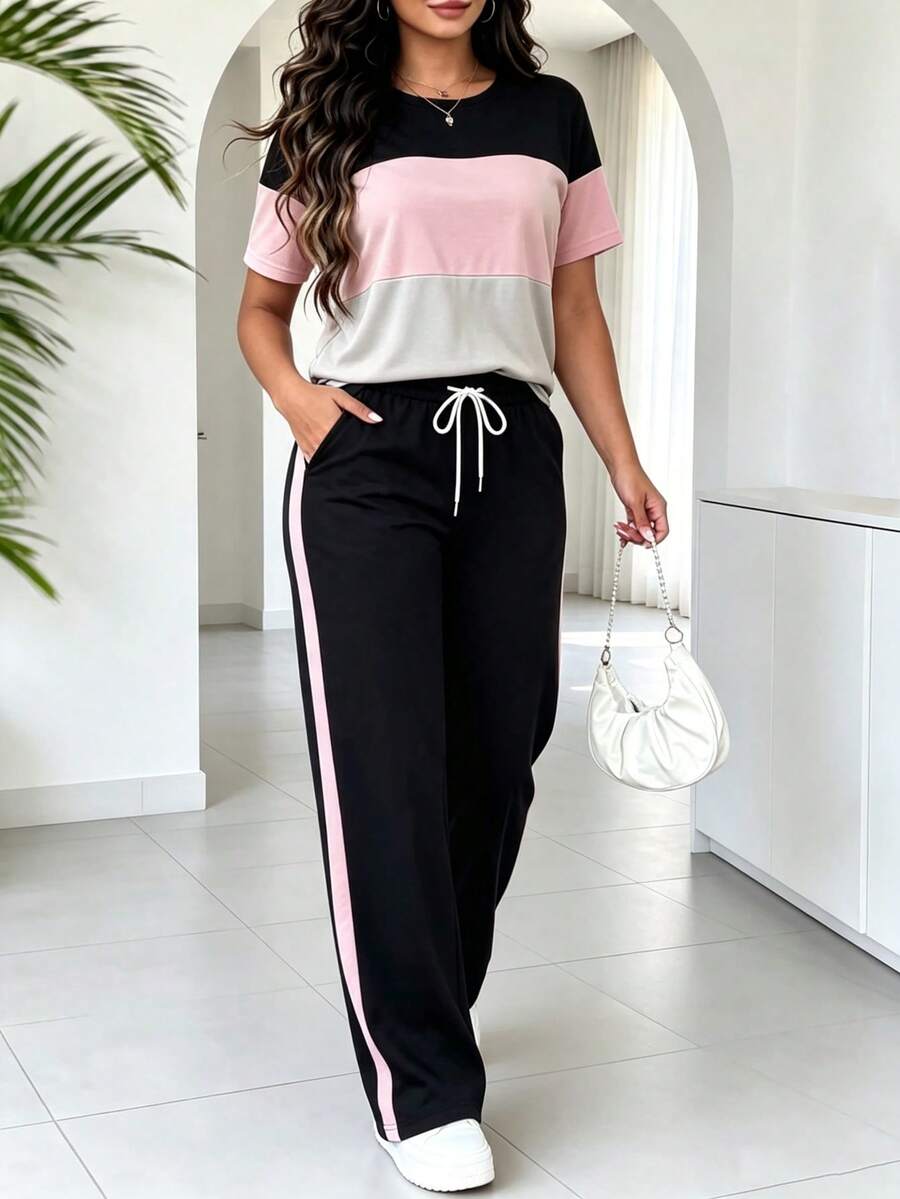Setelan 2 Potong Wanita Musim Semi/Panas Terbaru: Kaos Lengan Pendek Bergaris Leher Bulat dengan Celana Panjang Kasual Berpinggang Elastis dan Tali Serut, Setelan Pakaian Santai Rumahan Kasual dengan Saku dan Blok Warna, Setelan Kasual Olahraga Musim Panas, Nyaman untuk Bepergian - Hitam - View 1