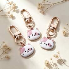 3 piezas Llavero mini con cara de gato kawaii, encantador colgante de cabeza de gato mascota, llavero de metal esmaltado con forma de gato, accesorio muy atractivo para bolso y billetera, pequeño regalo para mujeres y adolescentes, accesorio diario para amantes de los gatos, pequeño regalo de cumpleaños y vacaciones - Multicolor - Ver 1