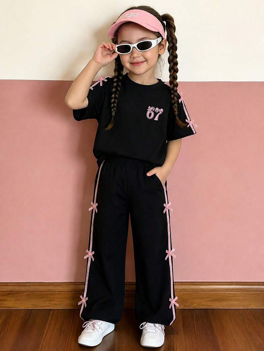 Young Girl Cartoon Print Bow Decor Round Neck Short Sleeve Top And Pants Set - Black - View 1
