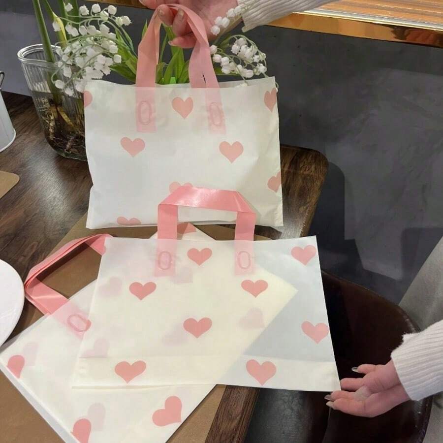 10入心形加厚塑膠禮品袋,適合情人節、生日與零售包裝 - 查看 1