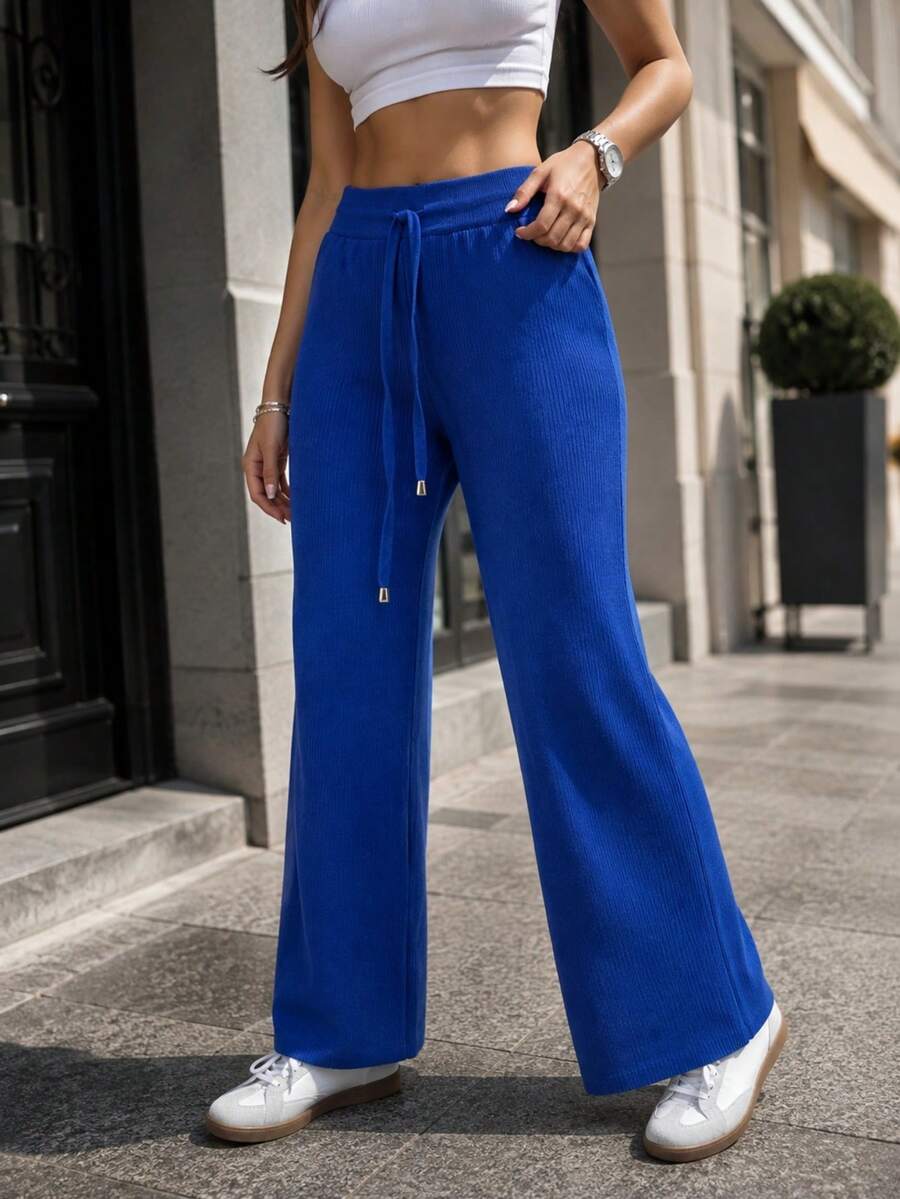 Pants de pierna ancha para mujer. Colores sólidos sin estampado. Ajuste de cintura natural con cordón ajustable. Sin bolsillos. Ideal para el uso diario. Textura tipo canalé. - Azul - Ver 1