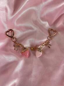 Accessoire de chaîne de breloque de sac fraise douce, pendentif de chaîne à nœud avec fermoir mousqueton en forme de cœur, style esthétique rose mignon, accessoire de sac à dos et de sac à main pour filles, porte-clés exquis, pendentif fraise en résine transparente avec décoration de nœud, palette de couleurs rose doux, peut décorer les sacs à main, les sacs bandoulière, les sacs à dos, très accrocheur en tant que breloque de sac, convient pour les cadeaux de couple, les cadeaux d'anniversaire, les cadeaux de fête, les charmes de sac à dos, les cadeaux de remise de diplôme, les accessoires quotidiens, la décoration de la maison, les cadeaux pour les meilleures amies - Multicolore - Voir 2