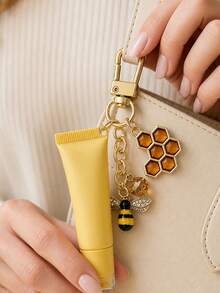Lindo llavero de tubo de brillo labial con abeja y panal de strass, colgante de abeja de esmalte amarillo dulce para bolso, llavero de coche de moda, accesorio de bolso exquisito, fácil de usar, regalo perfecto para niñas y mujeres, recuerdo de boda práctico y elegante, regalo de fiesta, regalo de cumpleaños, regalo del Día del Maestro, regalo de vuelta a la escuela, artículo práctico esencial para el desplazamiento diario, la escuela y los viajes - Multicolor - Ver 1