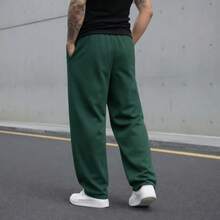Men's Green Sweatpants, Loose Fit, With Drawstring And Pockets. Long Length For A Casual Style. Spacious And Comfortable Fit. - Dark Green - View 2