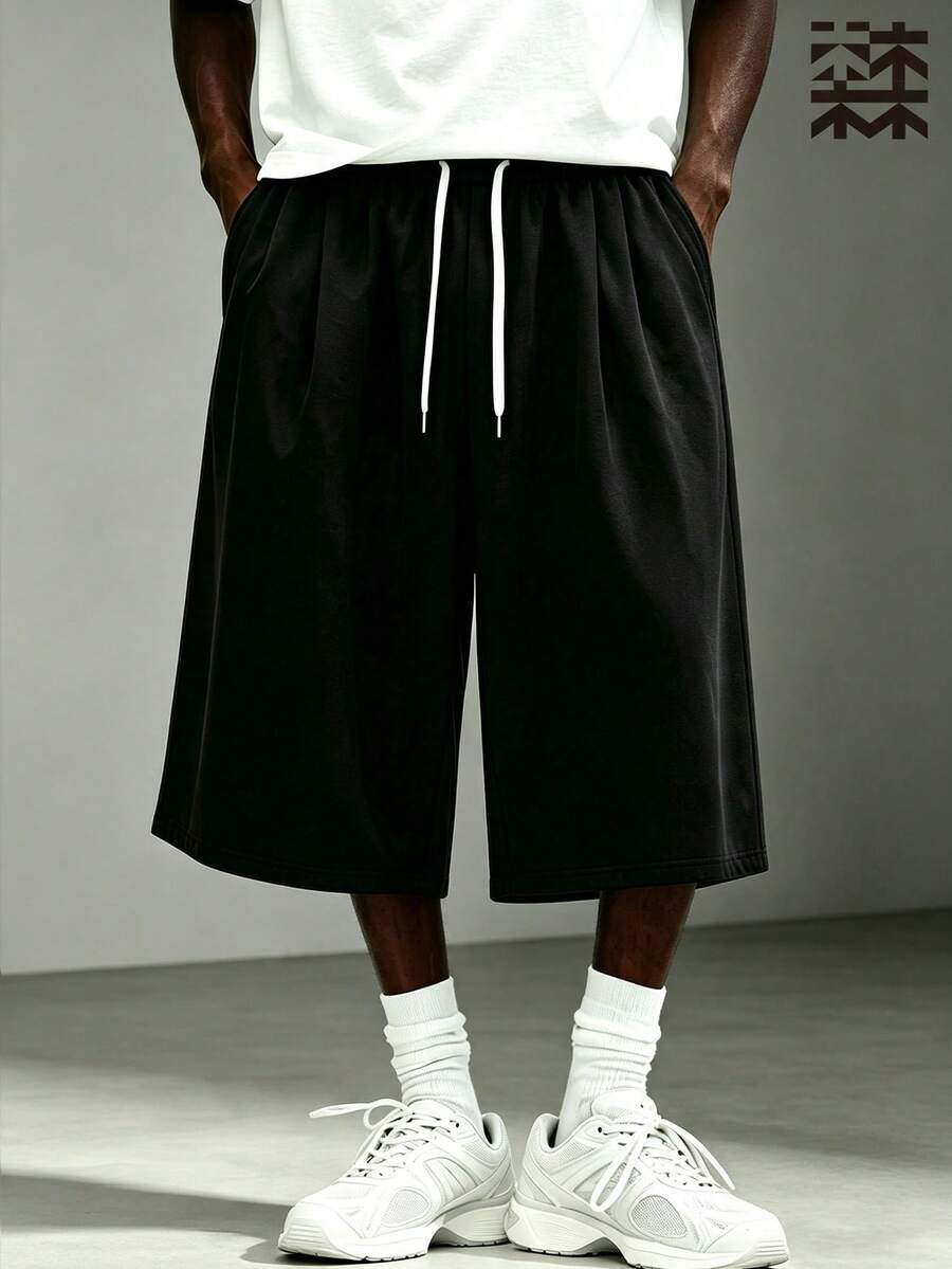 mulinsen Men's Drawstring Elastic High Waist Pleated 7/8 Length Sweatpants, Solid Color Front Waist Pleats, Loose Fit, Summer Commute, Shopping, Versatile Casual Mid-Length Pants - Black - View 1
