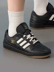 Adidas 女款經典休閒運動鞋 FORUM LOW CL W 輕量舒適透氣休閒鞋 JP9021 - 黑色/乳白色/金 - 查看 2